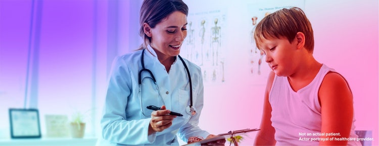 Actor portrayal of a healthcare provider speaking with a patient
